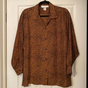 The Limited Silk oversized button front brown and black animal print  blouse.